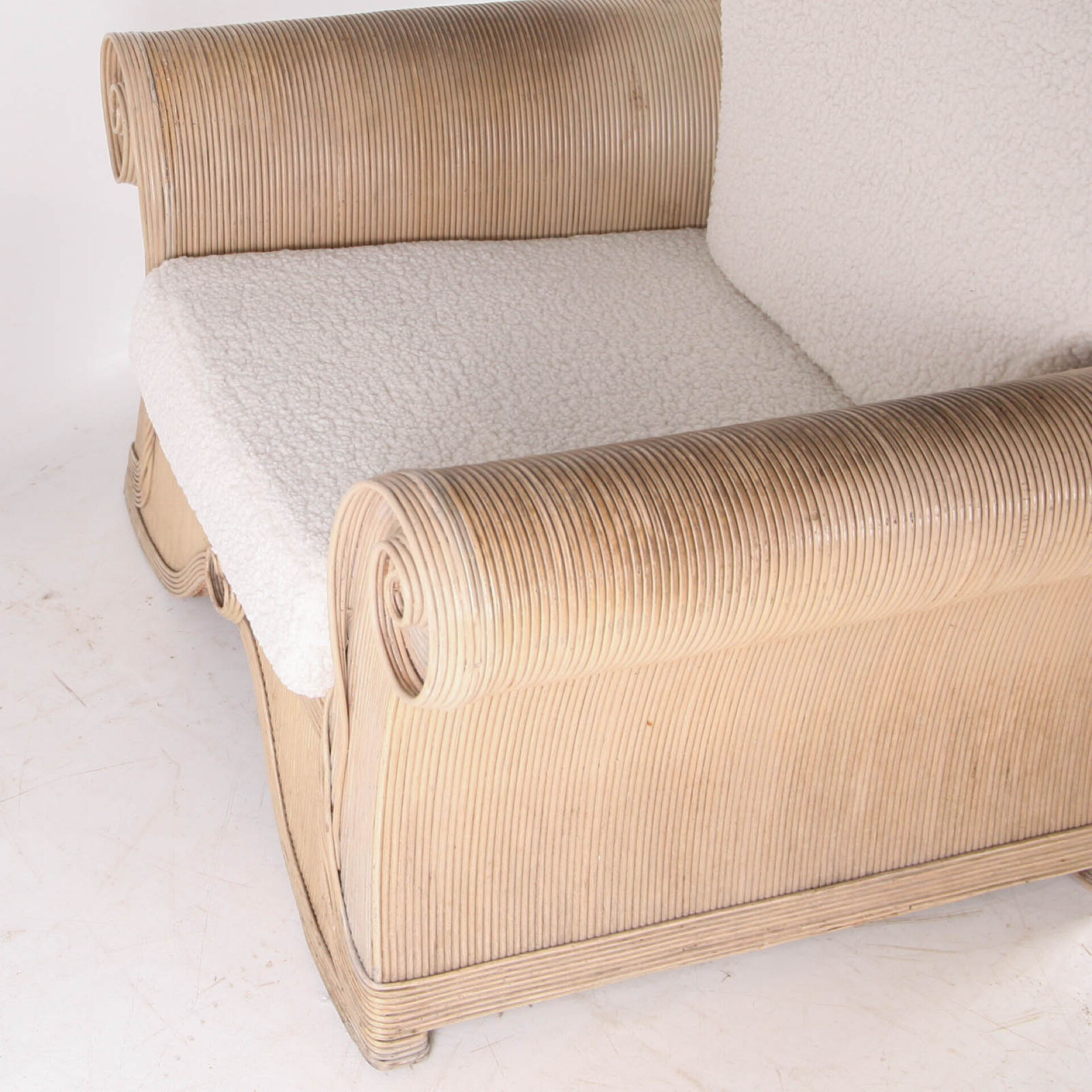 Rattan armchair by Betty Cobonpue