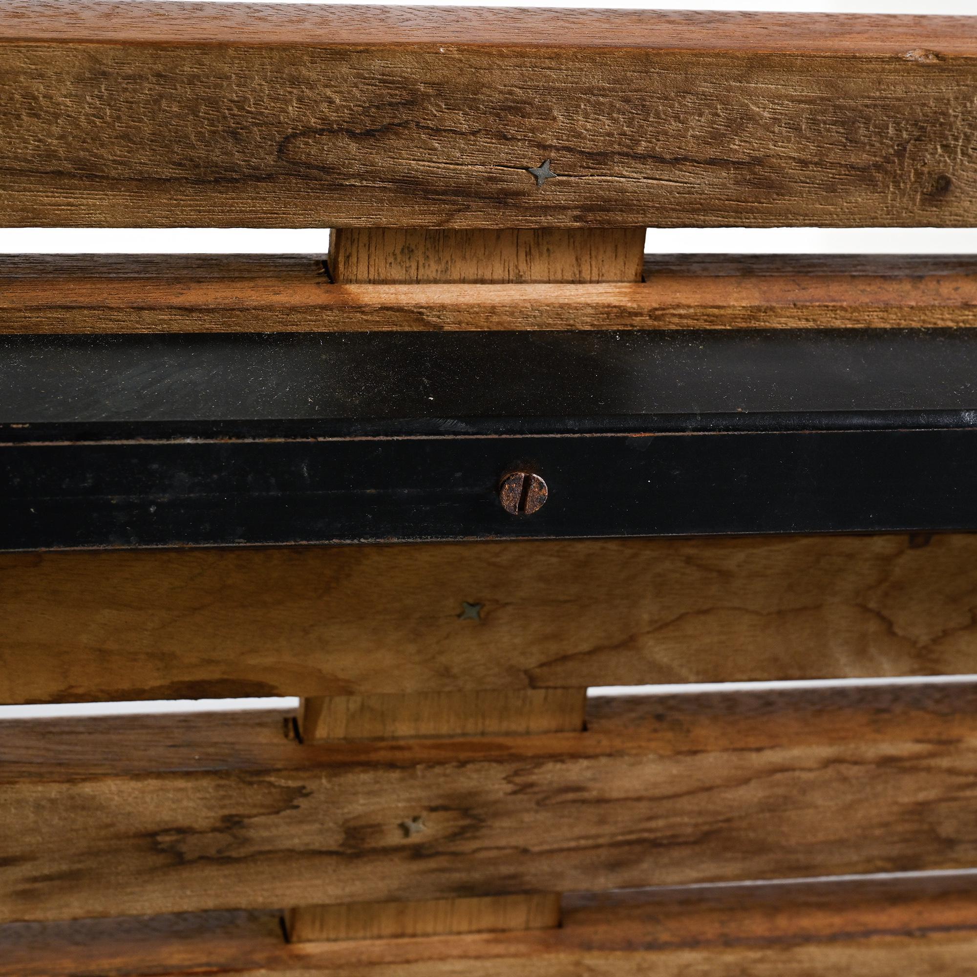Cansado bench in mahogany by Charlotte Perriand, circa 1962.