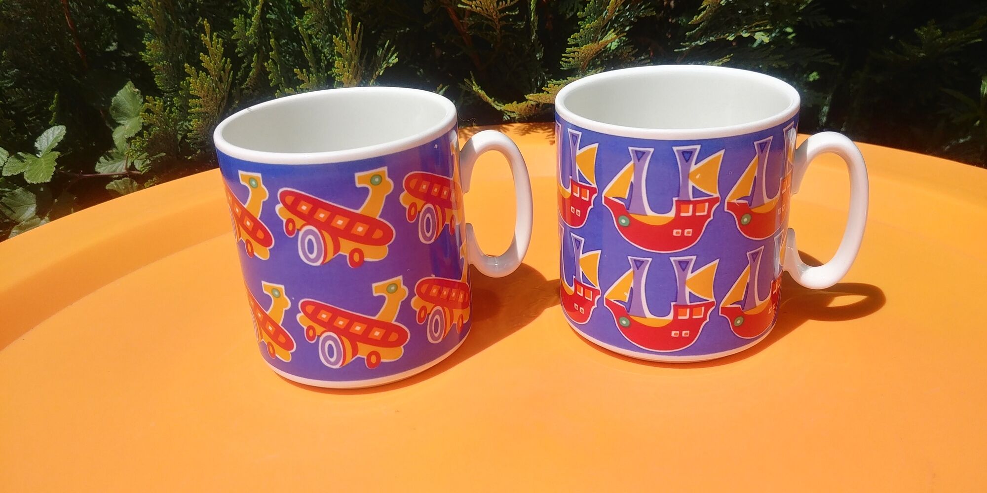 Two mugs/cup in porcelain from Villeroy and Boch decoration boat / plane made in Luxembourg