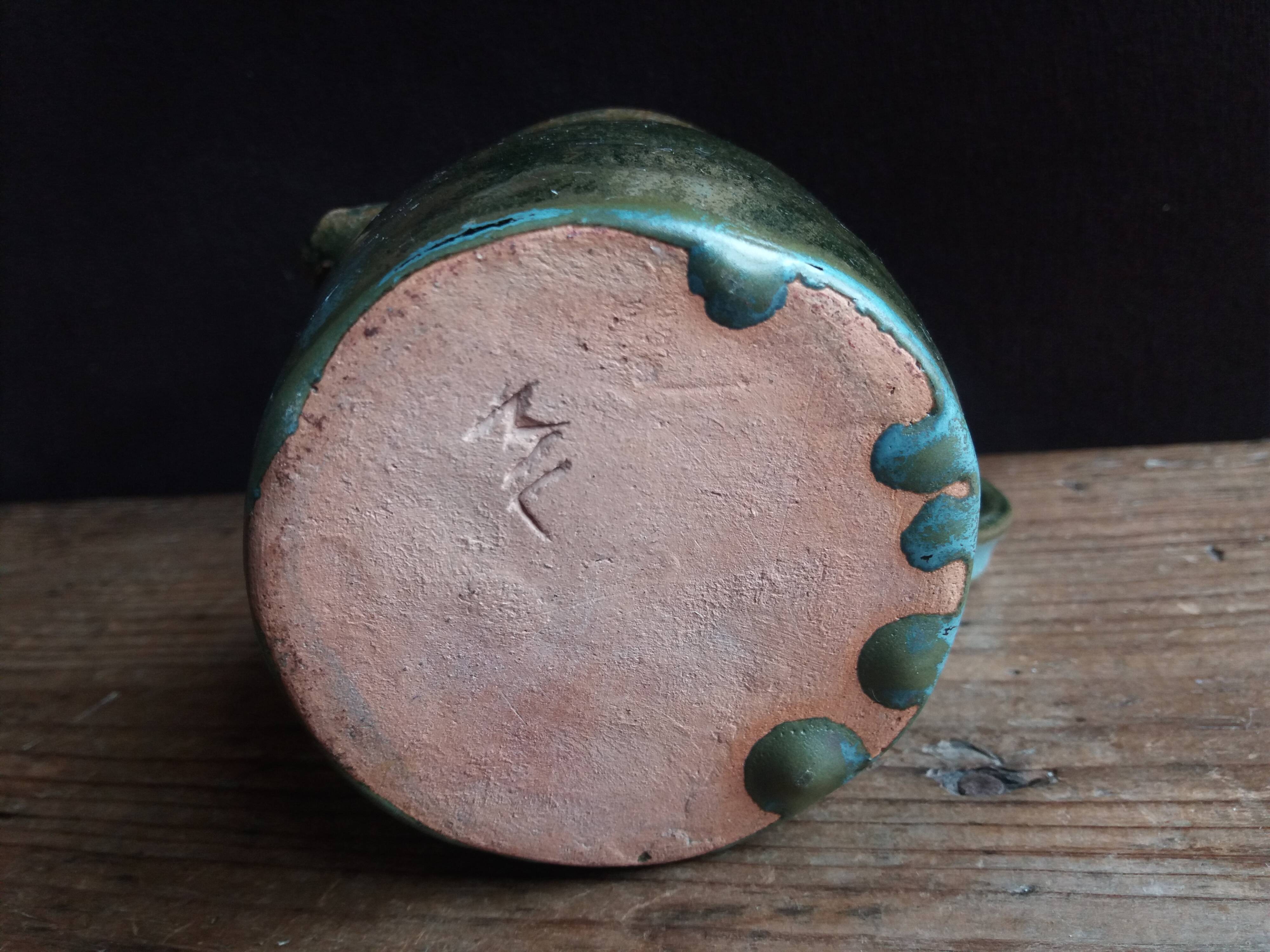 Handcrafted enameled terracotta pitcher signed