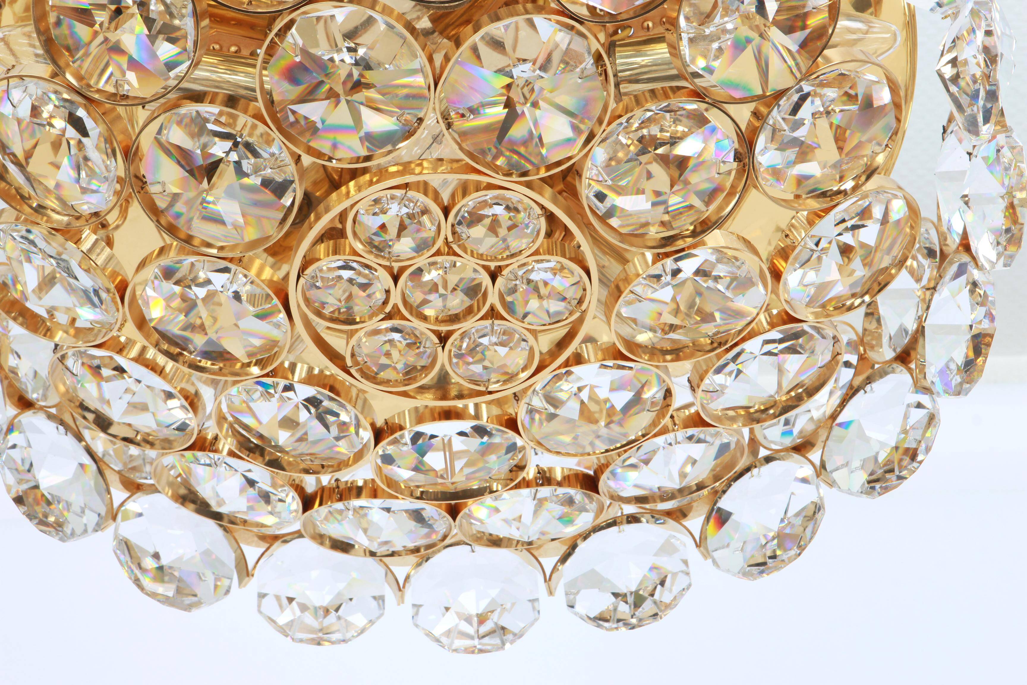 Chandelier in gilded brass and crystal glass inlaid by Palwa, Germany, 1970s.