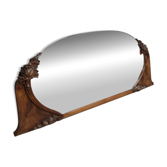Important Miroir époque Art Déco, au format panoramique, orné de sculptures