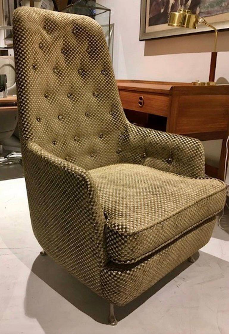 Mid-century buttoned armchair with metal legs