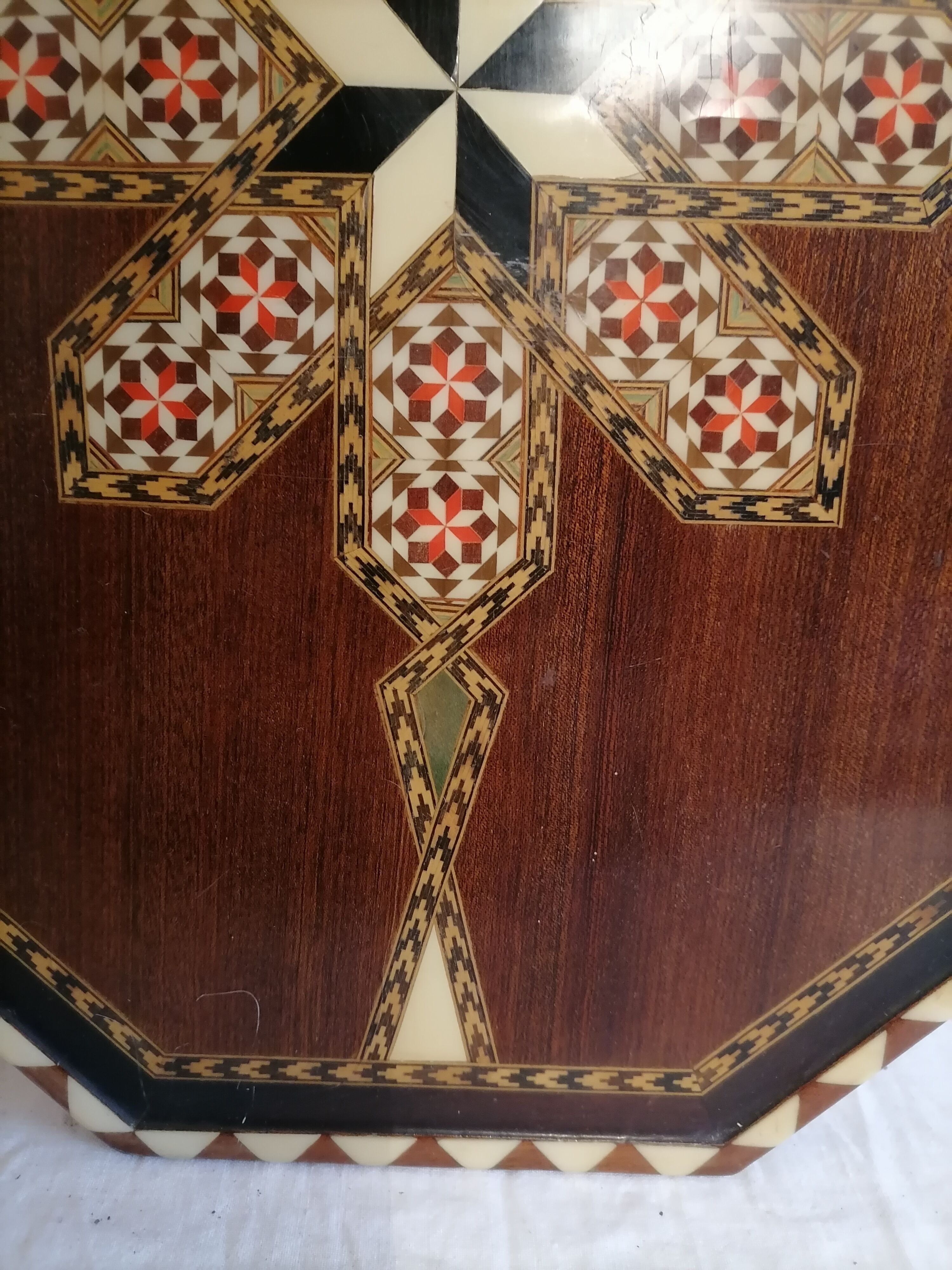 Old oriental plateau in marquetry.
