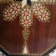 Old oriental plateau in marquetry.