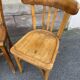 4 mismatched curved wooden bistro chairs