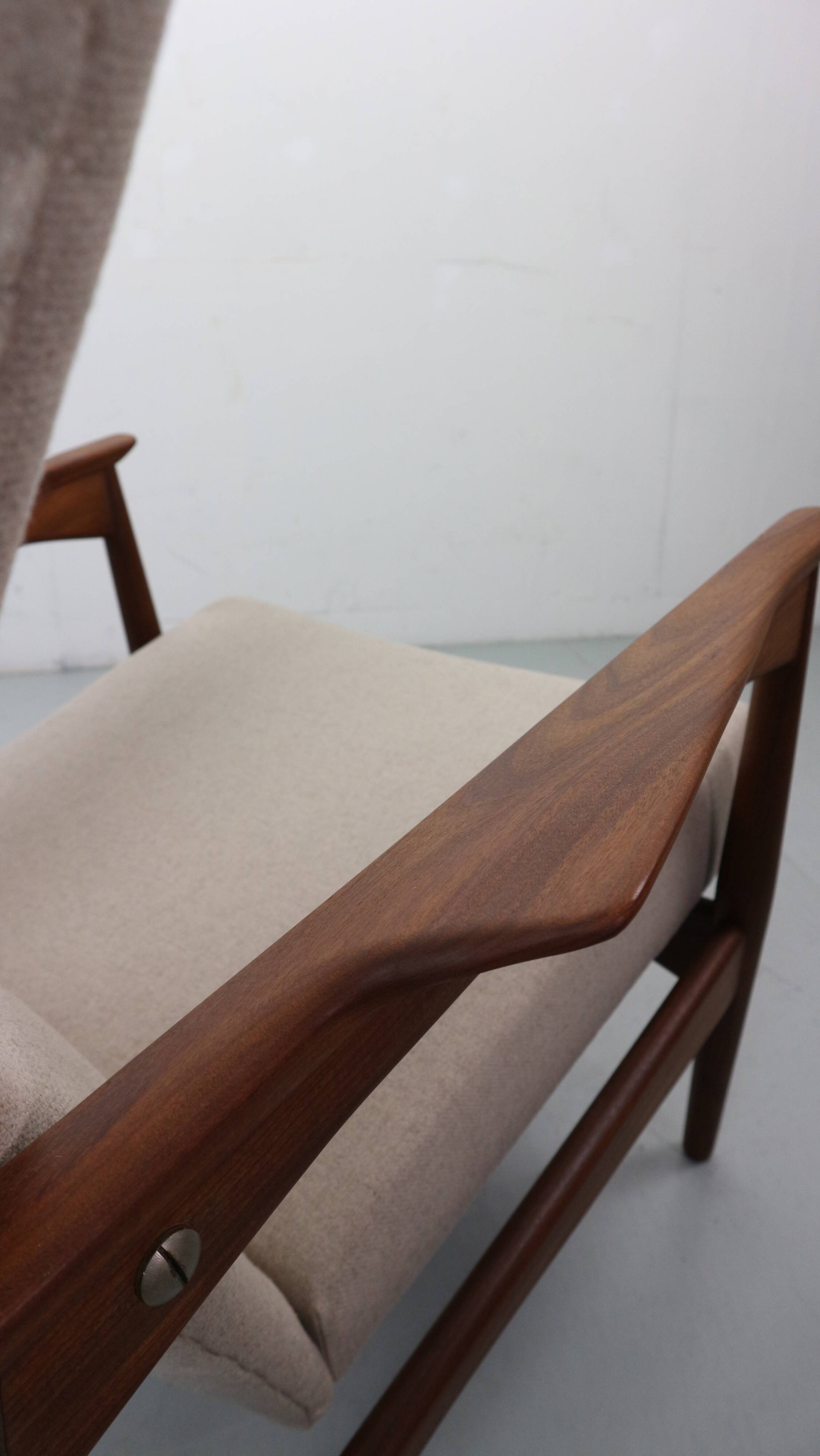 Danish adjustable wingback lounge chair in teak by Ib Kofod Larsen