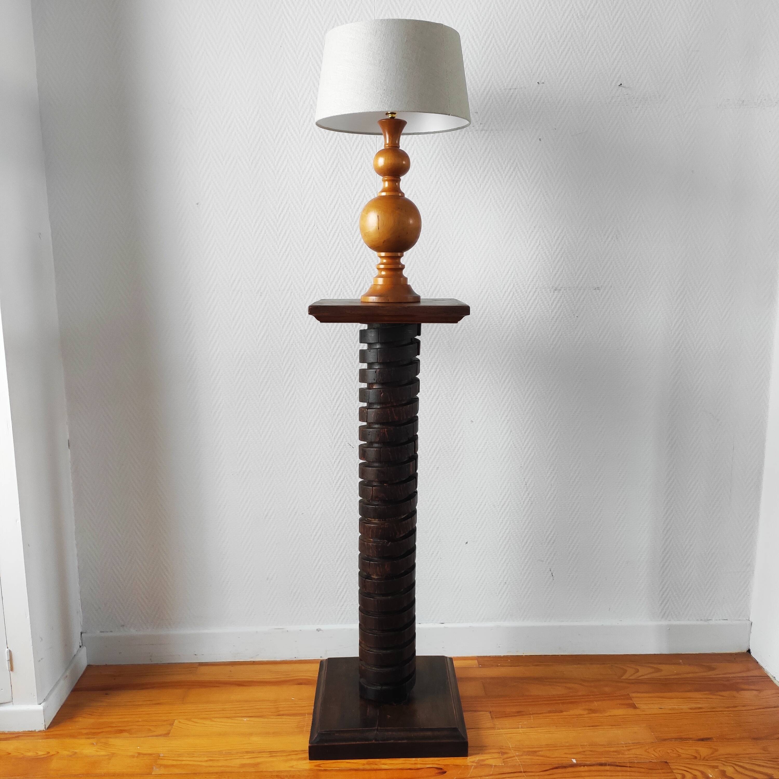 Brutalist column – old Burgundy press screw