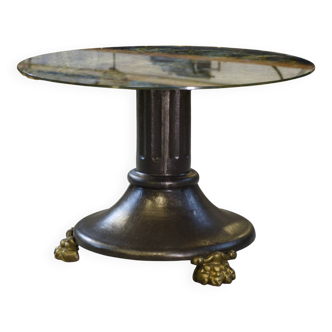 Neo-classical cast iron and glass eglomisé coffee table from the 1940s.