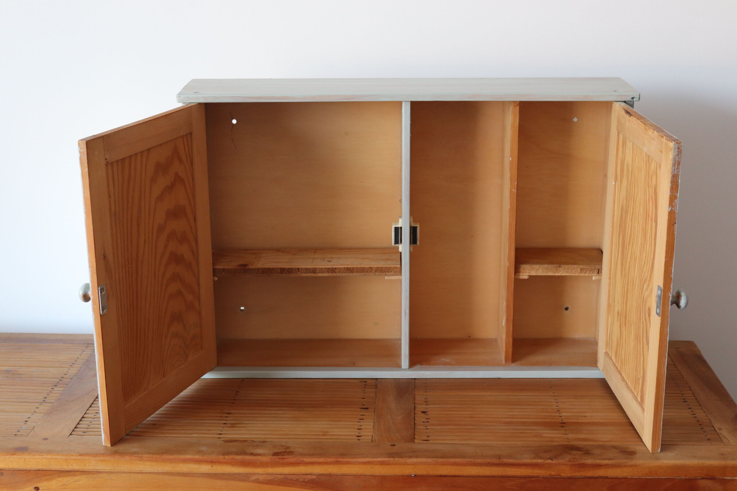 Greyed wood medicine cabinet