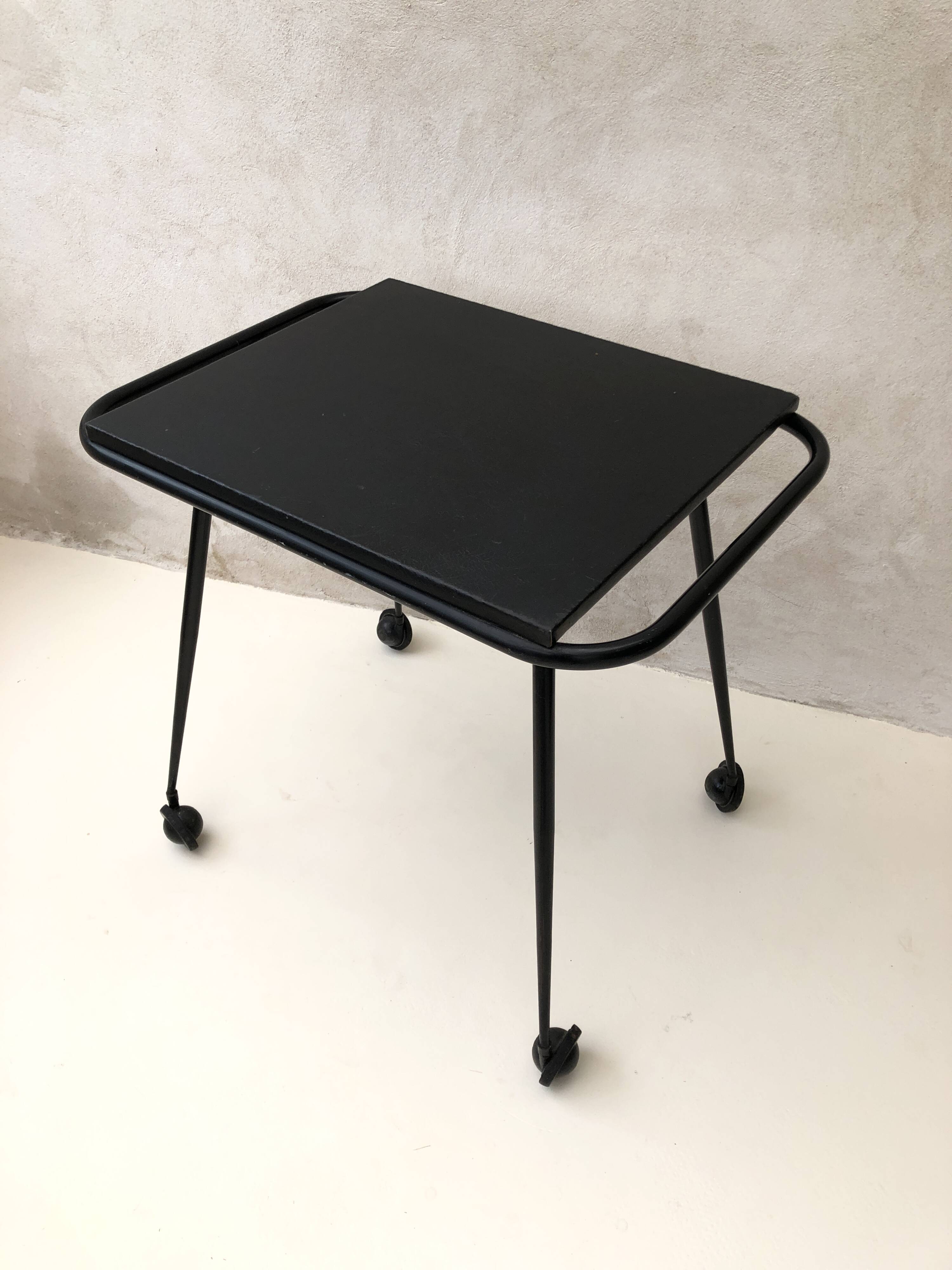 Black table on wheels from the 60s