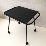 Black table on wheels from the 60s