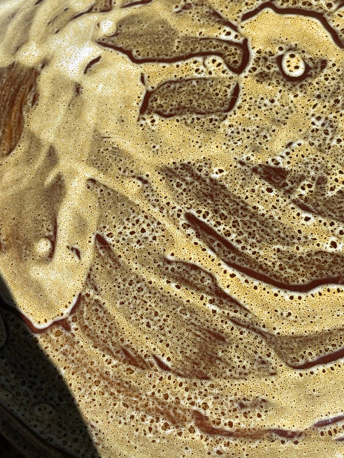 Pair of green glazed stoneware ceramic plates