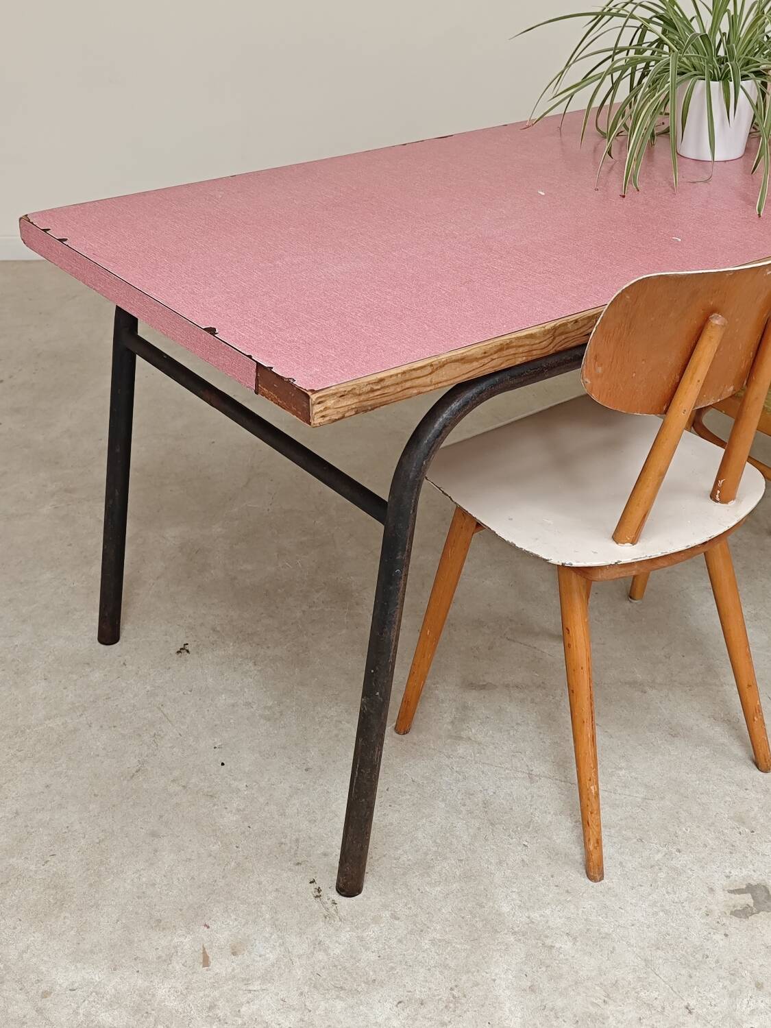 Large canteen table in pink formica and metal.