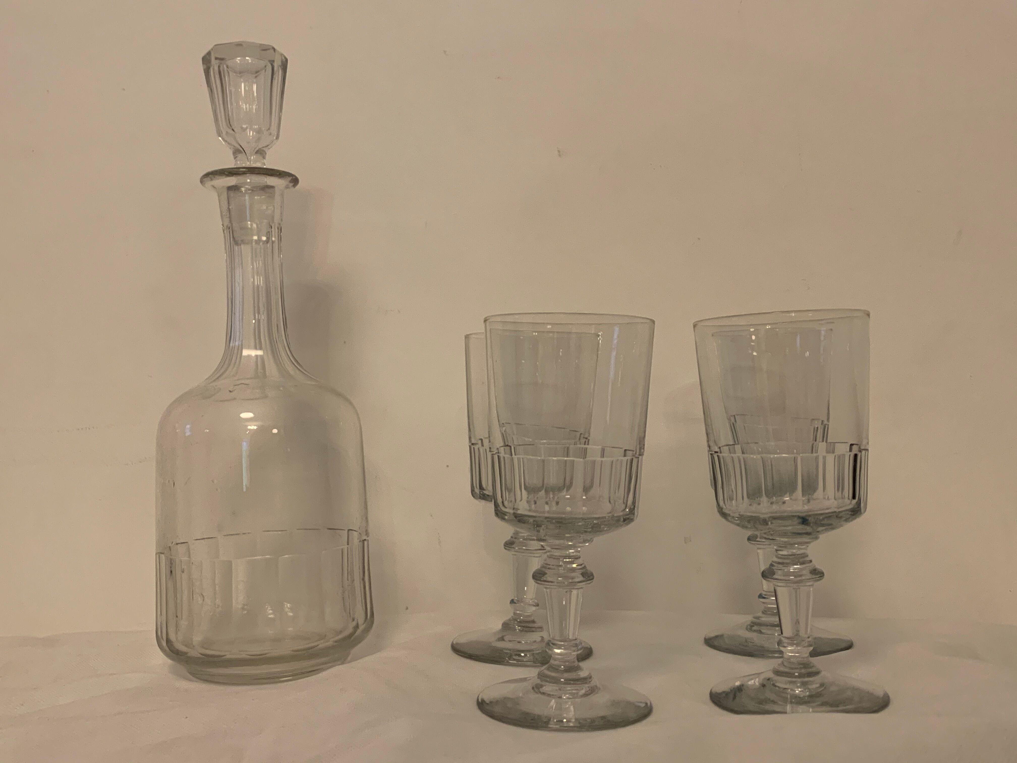 Set of 4 glasses and 1 carafe model Mirabeau early twentieth century