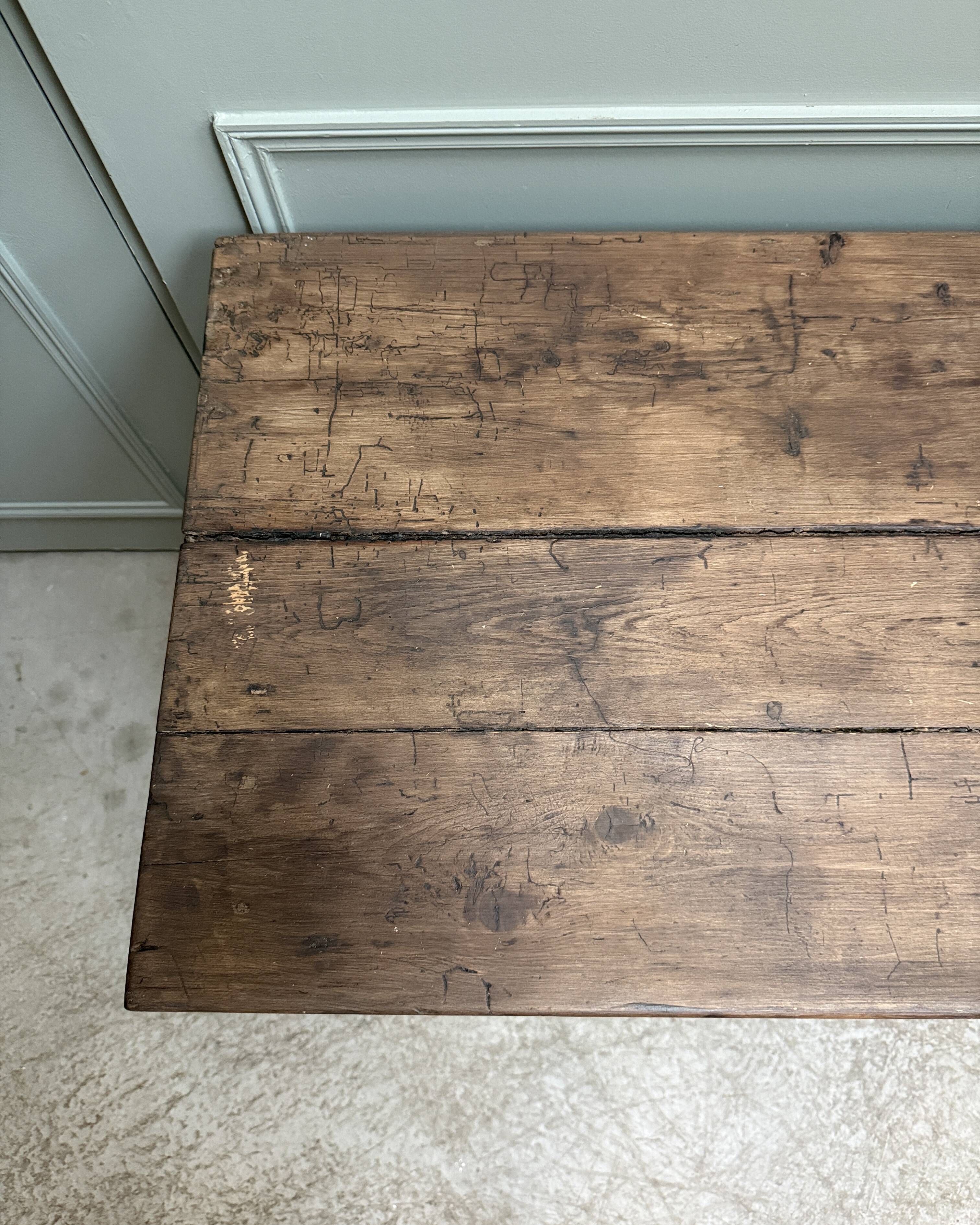 Small antique desk on wheels