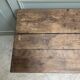 Small antique desk on wheels