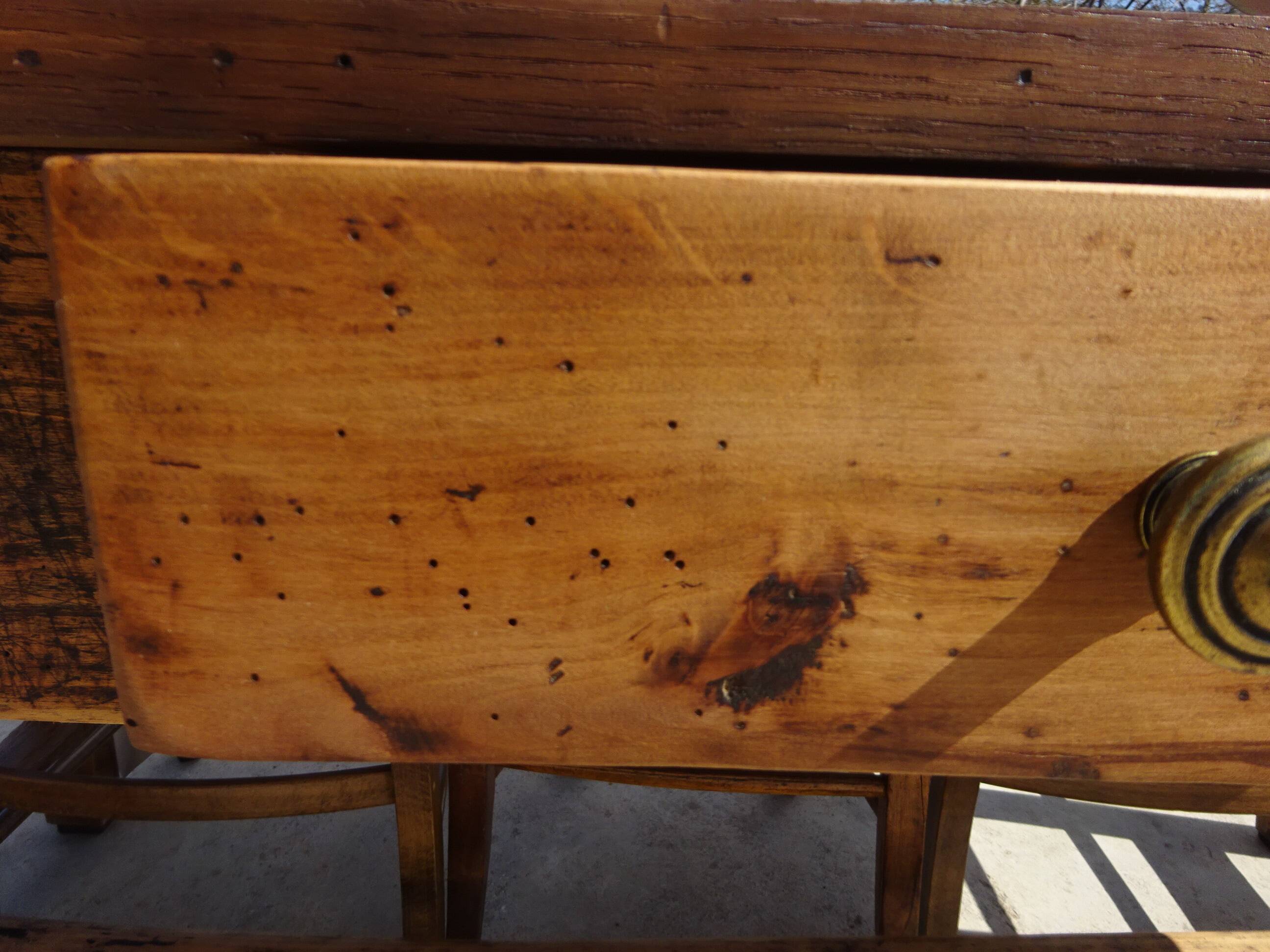Old farmhouse table made entirely of restored solid oak.