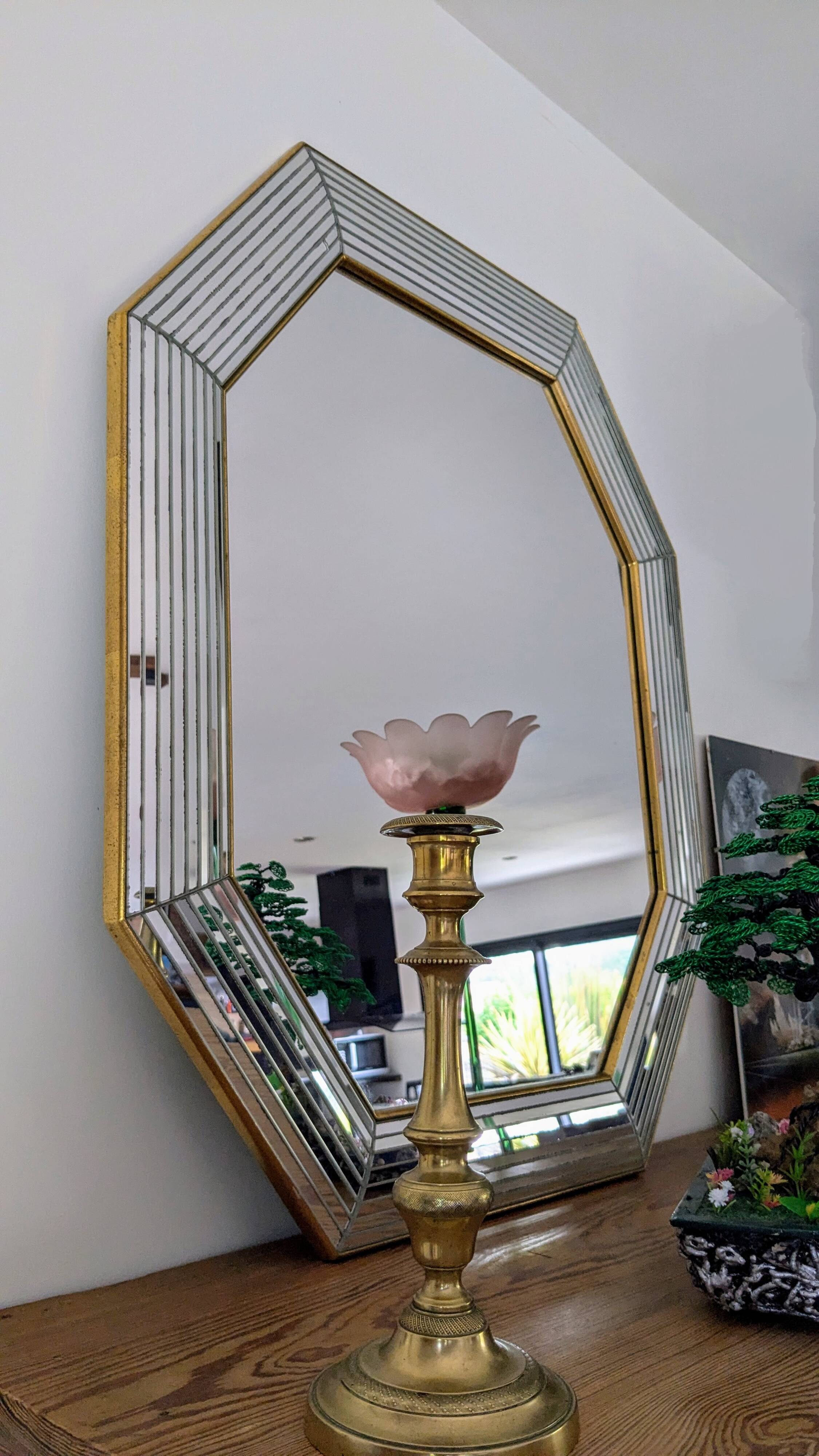 Octagonal mirror with brass parcloses by Jan Deknudt