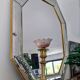 Octagonal mirror with brass parcloses by Jan Deknudt