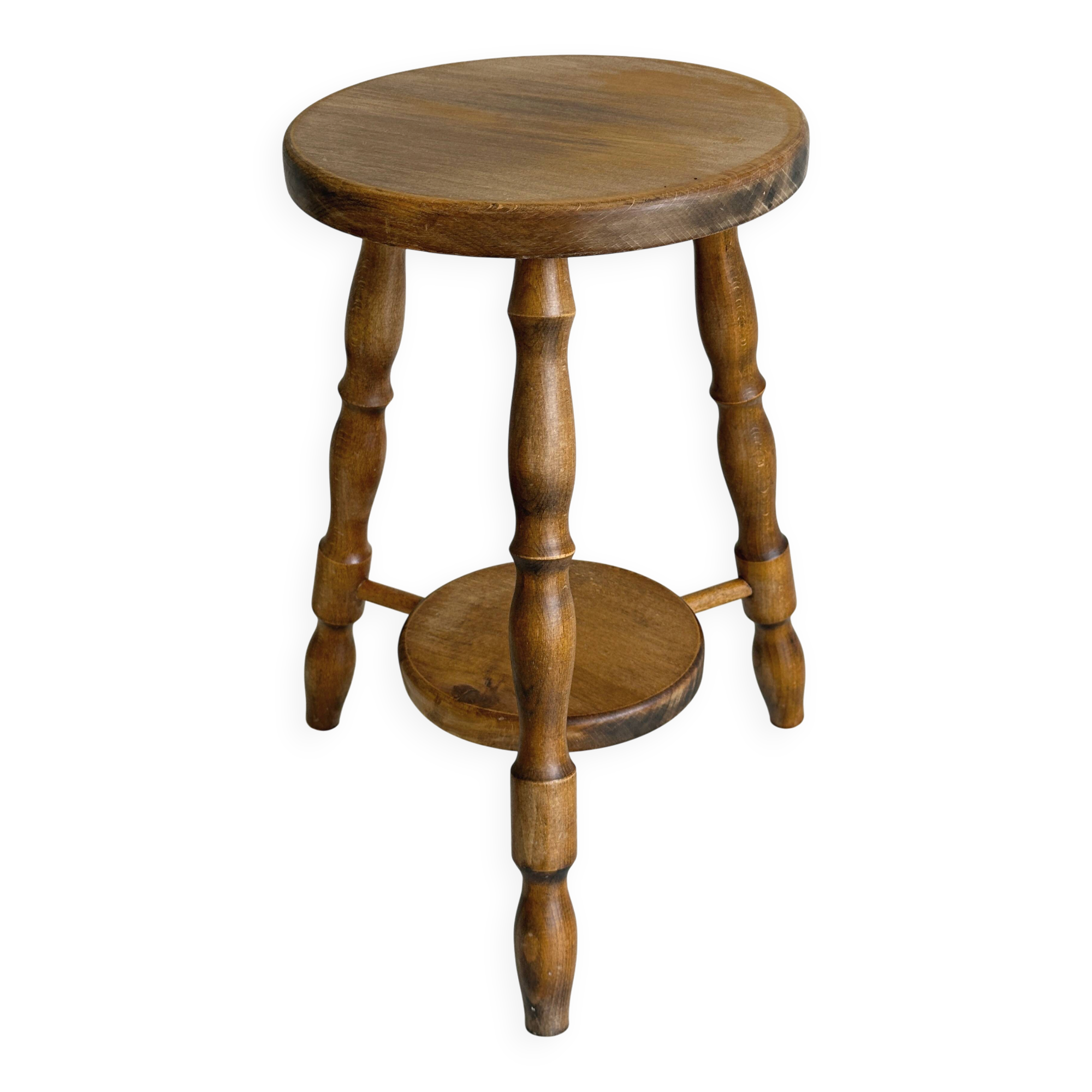 Tabouret vintage en bois tourné avec tablette basse