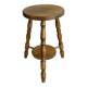 Tabouret vintage en bois tourné avec tablette basse