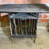 Antique writing desk, blackened wooden filing cabinet.