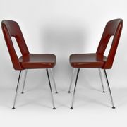 Pair of chairs in chrome and skaï, circa 1960