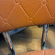 Armchair with armrests from the 70s in Skai and chrome.