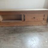 Base-shaped coffee table in light ash with a drawer and a compartment
