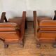 PAIR OF BRUTALIST ARMCHAIRS IN TEAK AND VINTAGE COGNAC LEATHER FROM THE 1950S