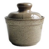 Gray and white speckled ceramic pot.