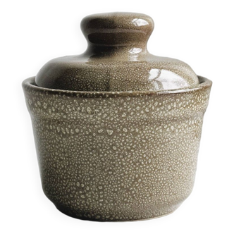 Gray and white speckled ceramic pot.