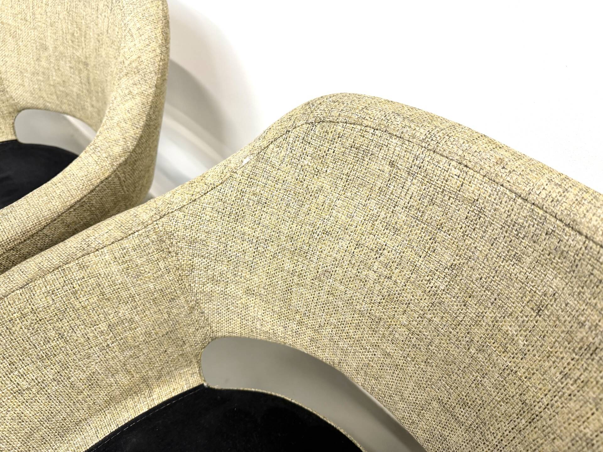 Series of six swivel chairs with an organic shell, patterned fabric and base.