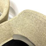 Series of six swivel chairs with an organic shell, patterned fabric and base.