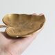 Empty old brass leaf bags