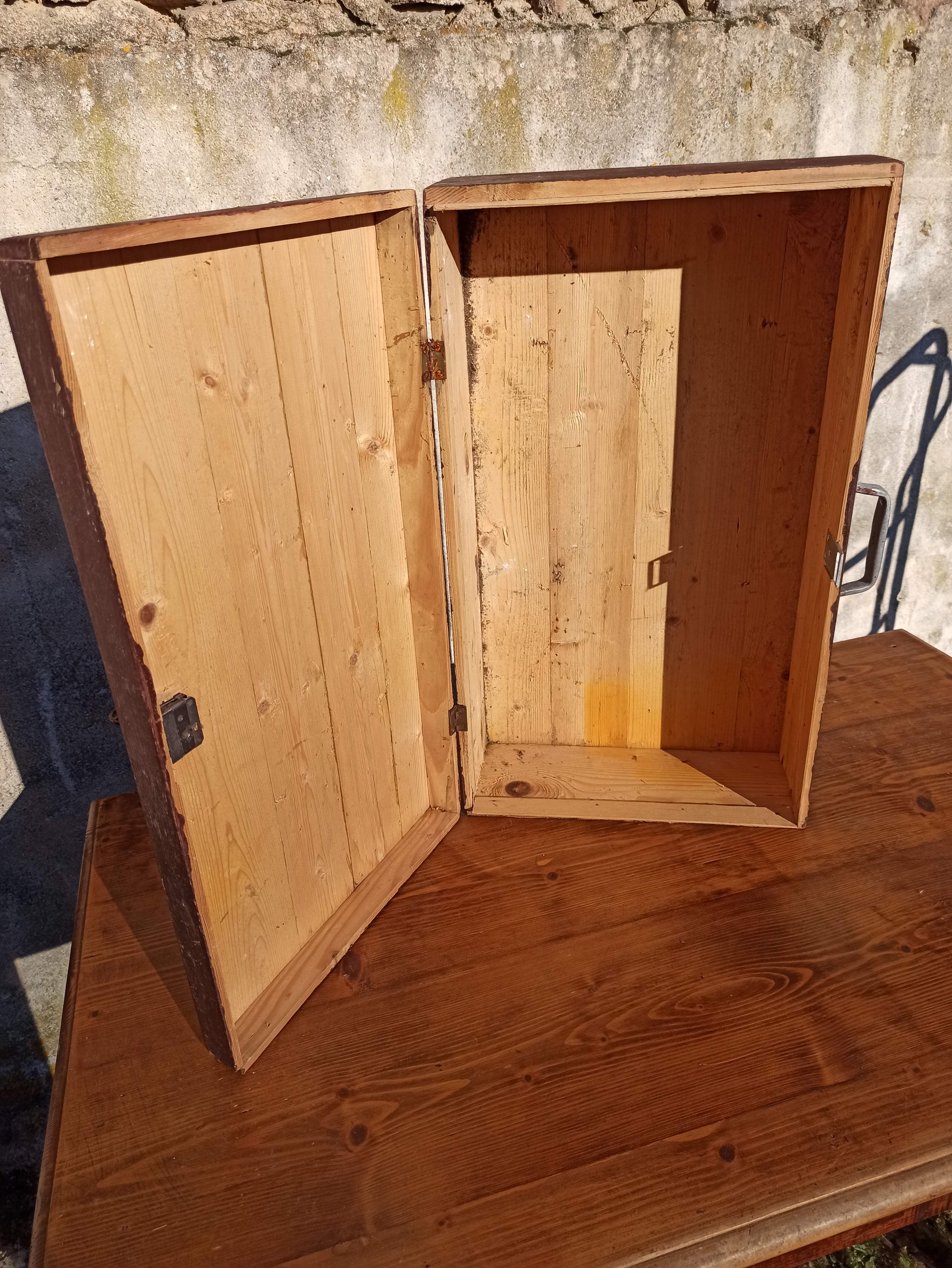Antique wooden suitcase with lock and key