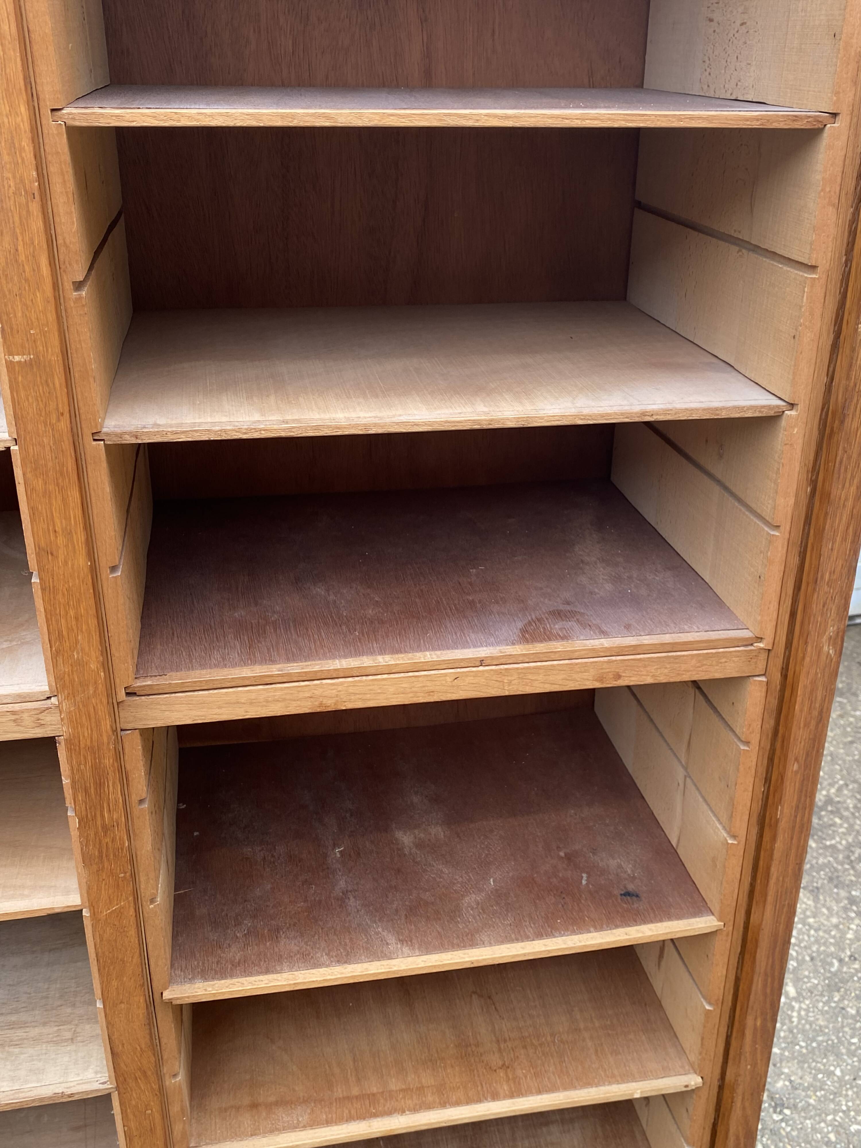 Double-column oak filing cabinet with curtains, 1950s.