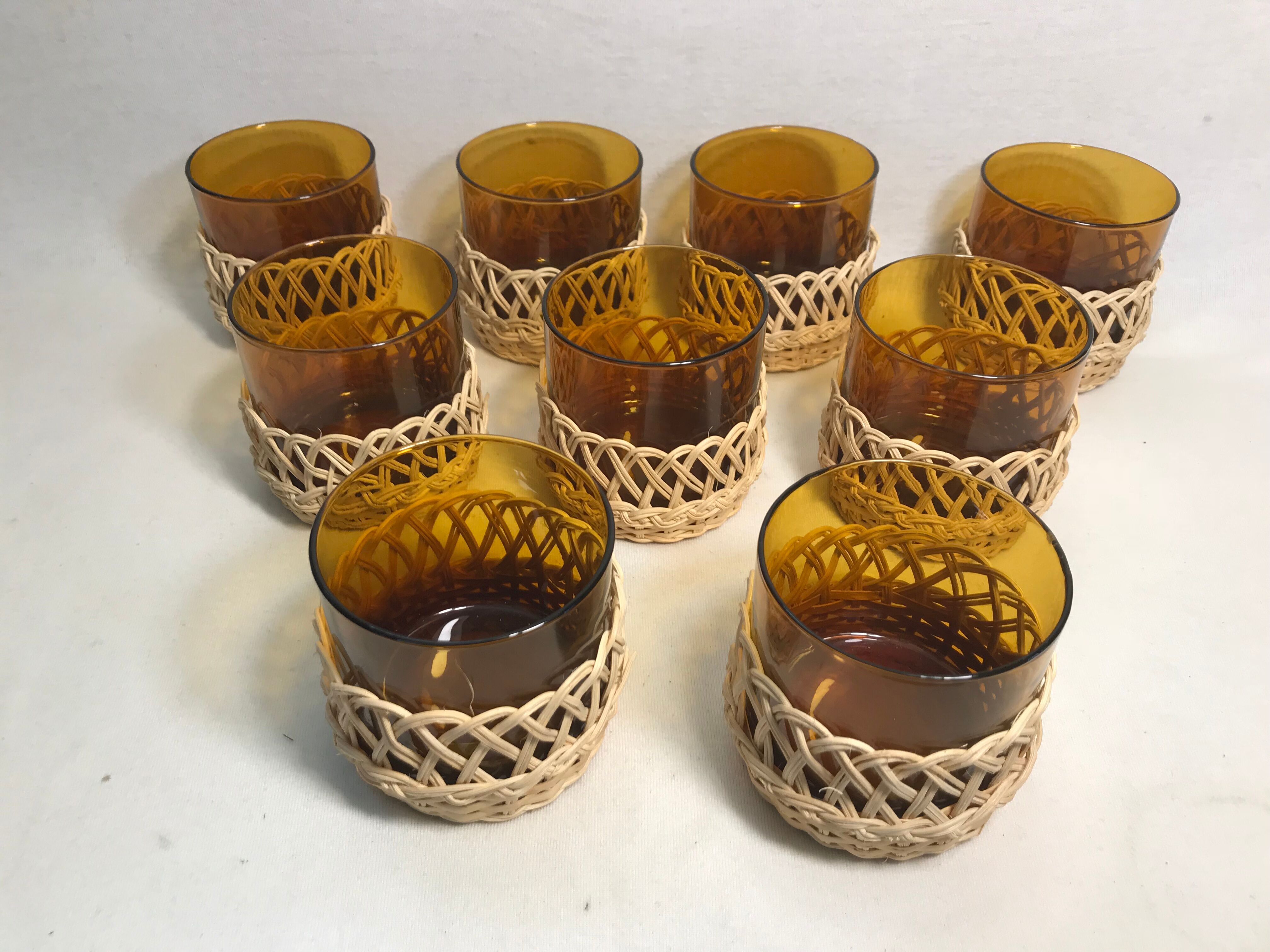 Service old juice carafe and its 9 orange glasses