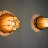 Pair of pear-shaped "cocoon" wall lights, resin and pine, Italy, 1970