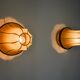 Pair of pear-shaped "cocoon" wall lights, resin and pine, Italy, 1970