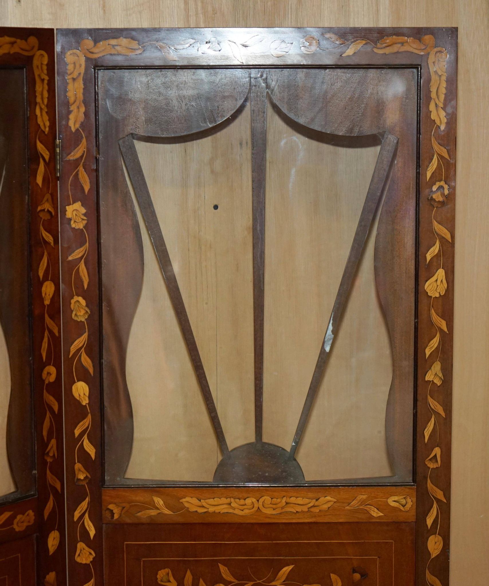 Pair of three-panel screens made of Dutch hardwood and walnut.
