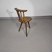 Old farmers tripod chair for decorative use