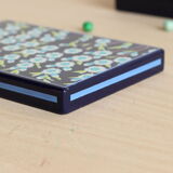 Enamelled sheet metal box floral pattern by Jean Neuhaus
