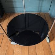 Vintage side table on wheels – black glass top