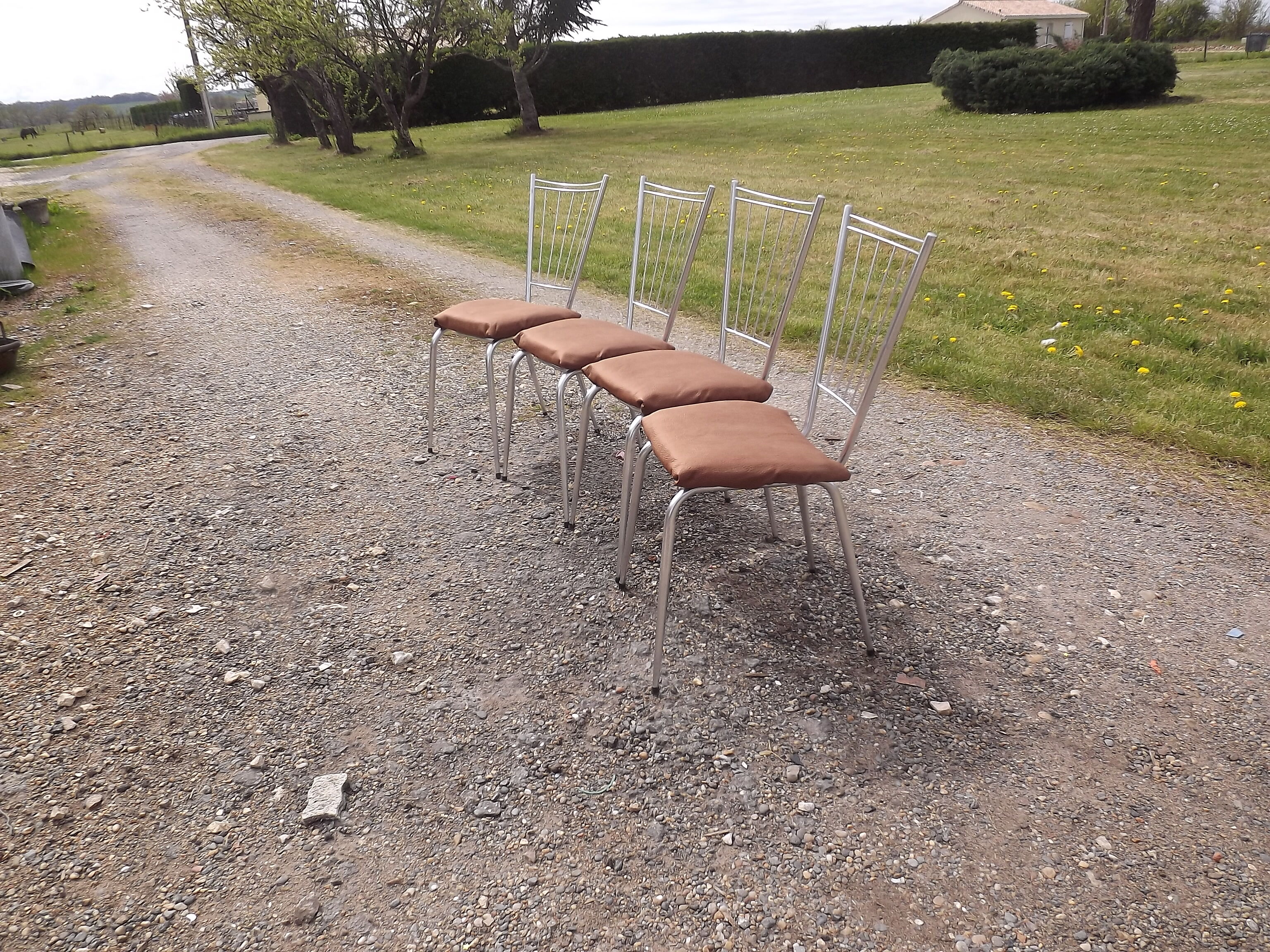 4 vintage chrome and skai chairs