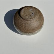 Small white ball vase tight neck in glazed speckled ceramic