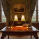 Art Nouveau style brass "rise and fall" table lamps after WAS Benson