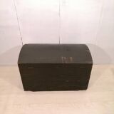 Large travel trunk in blackened wood