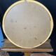 Round mirror from the 1960s with a frame made of rattan and metal.